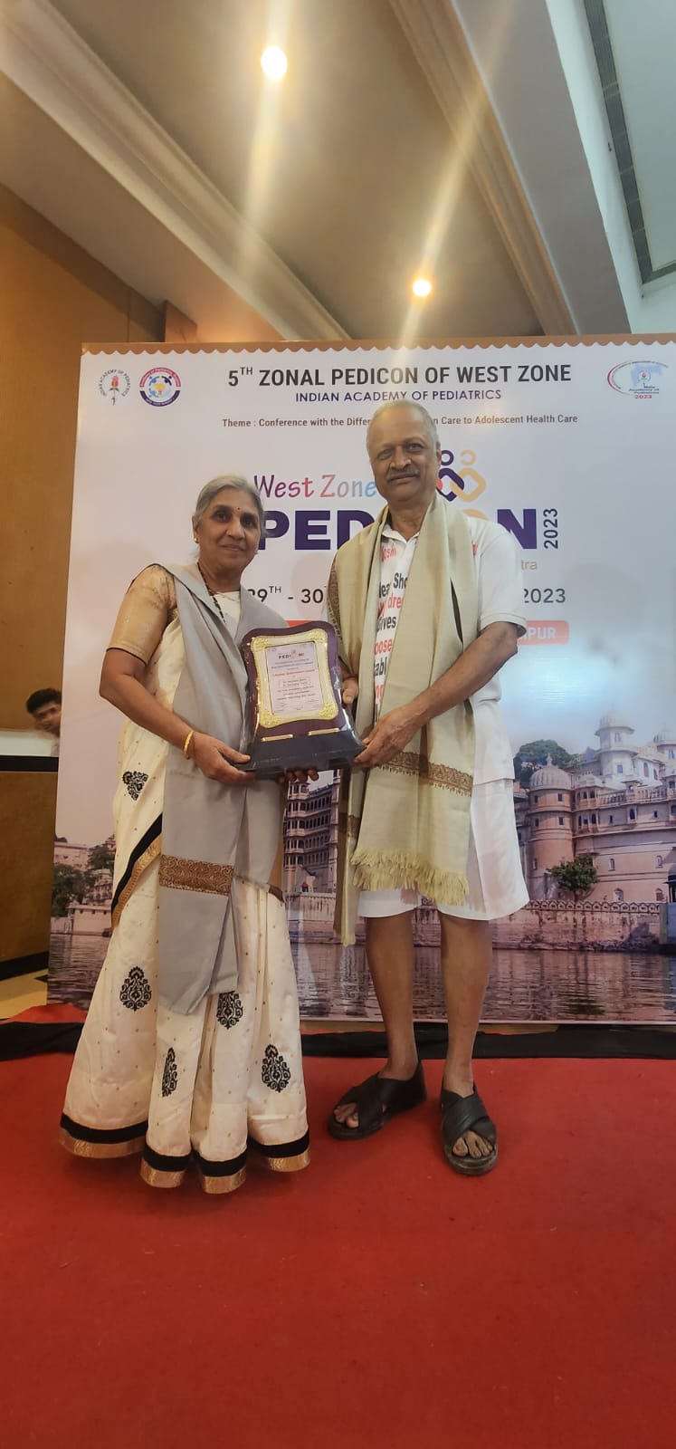 "Doctors Archana and Hemant Joshi Awarded for Addressing Health Issues in Rajasthan"