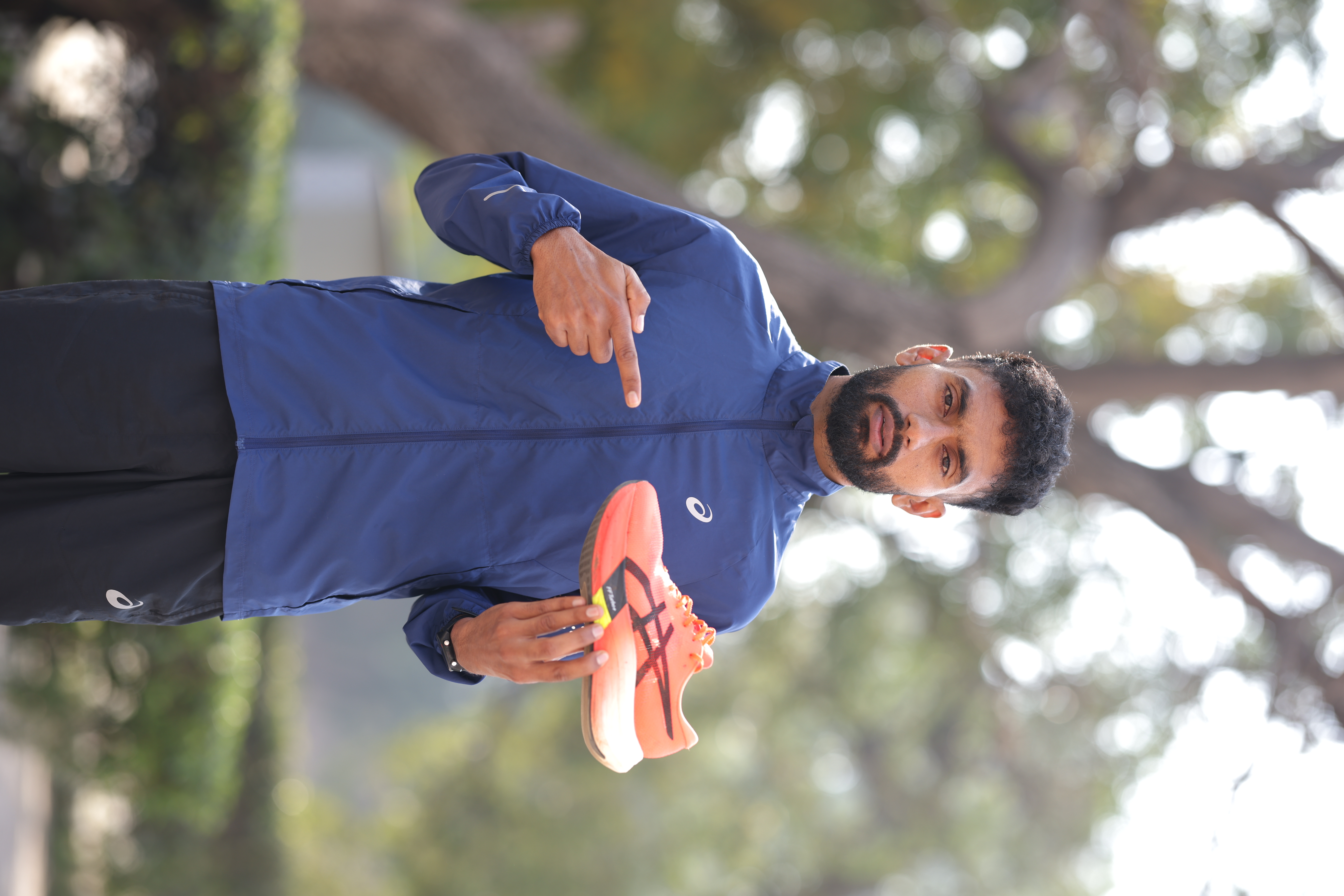 ASICS Athlete Harmanjot Singh dominates the track, securing a win in the Half  Marathon category