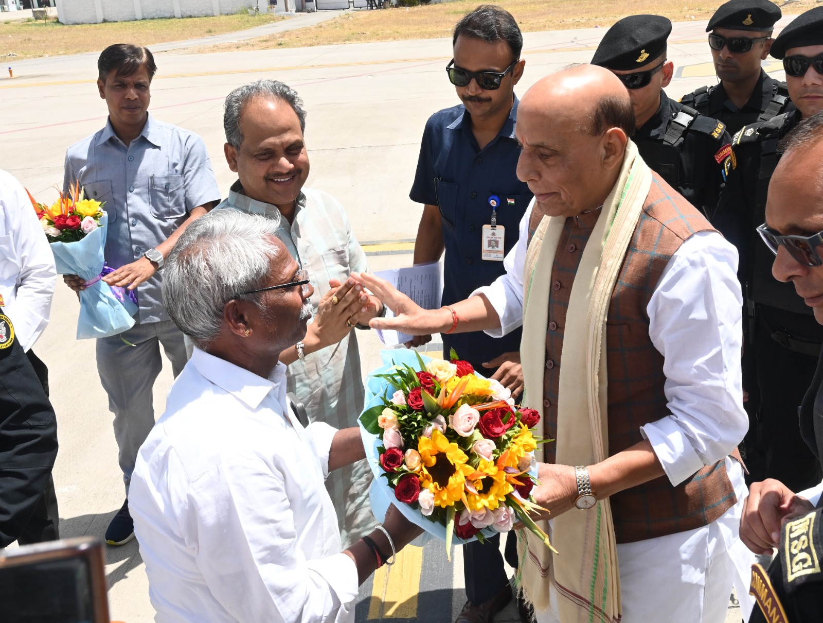 Defence Minister Rajnath Singh Welcomed at Dabok Airport