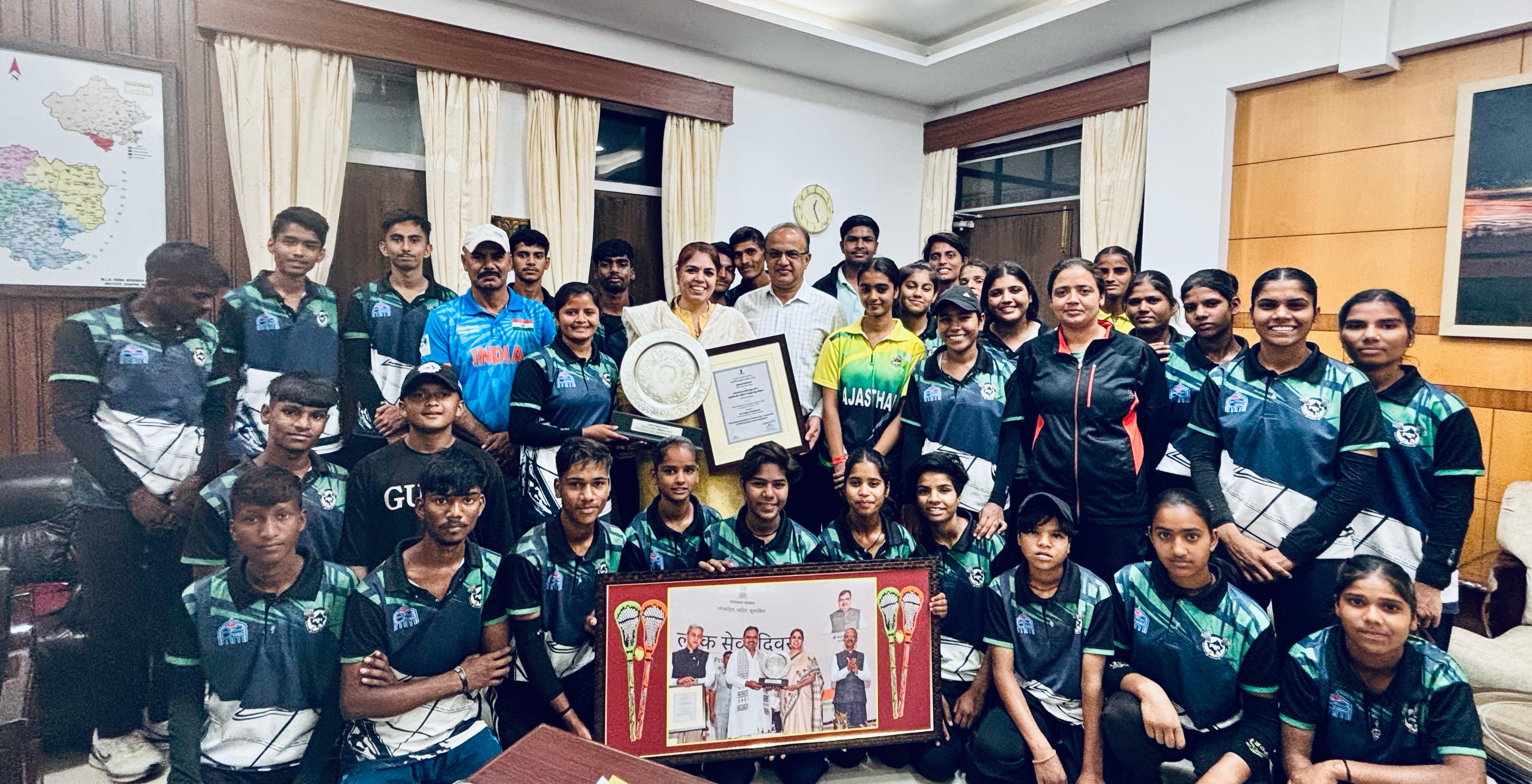 ### Lacrosse Players Felicitate Divisional Commissioner Honoured with Chief Minister’s Excellence Award