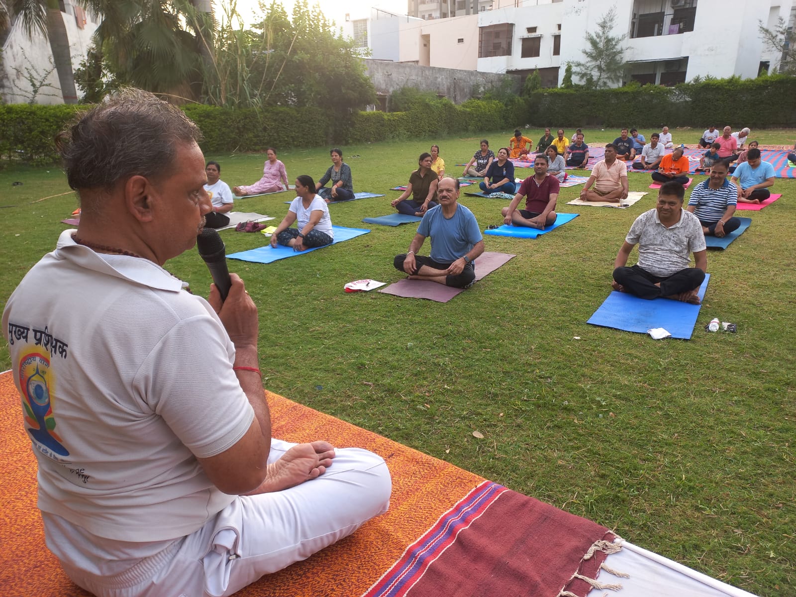 Children enthusiastically practicing yoga at Patanjali Yoga Camp